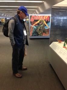 Visitor to exhibit of Japanese toys at the San Francisco Airport